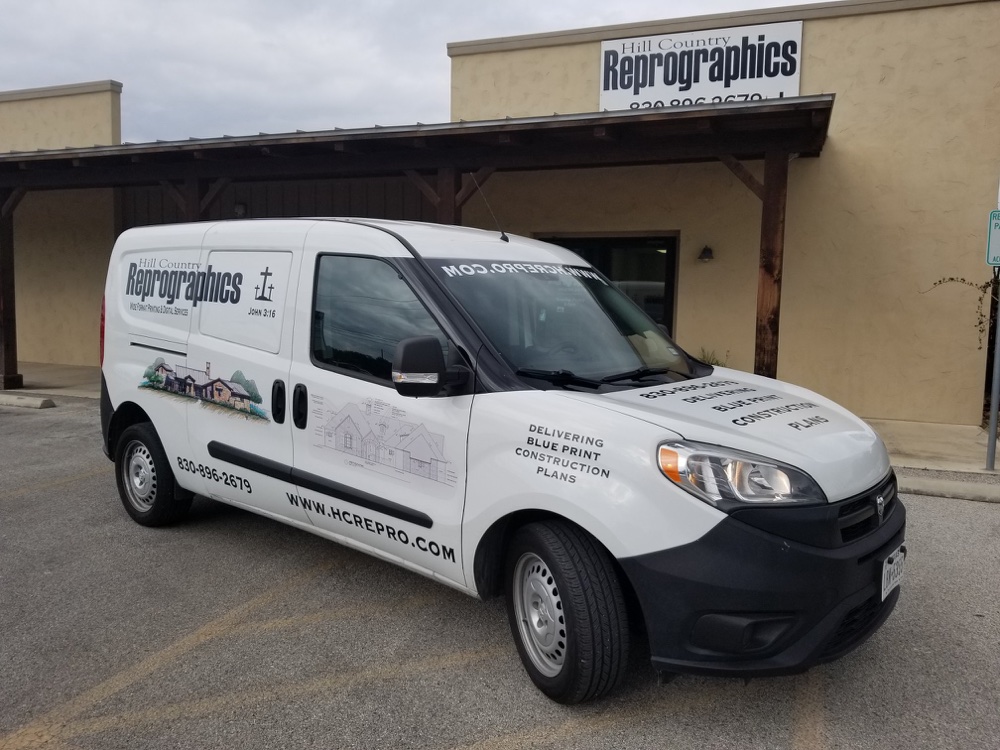 Hill Country Reprographics delivery van parked outside the shop