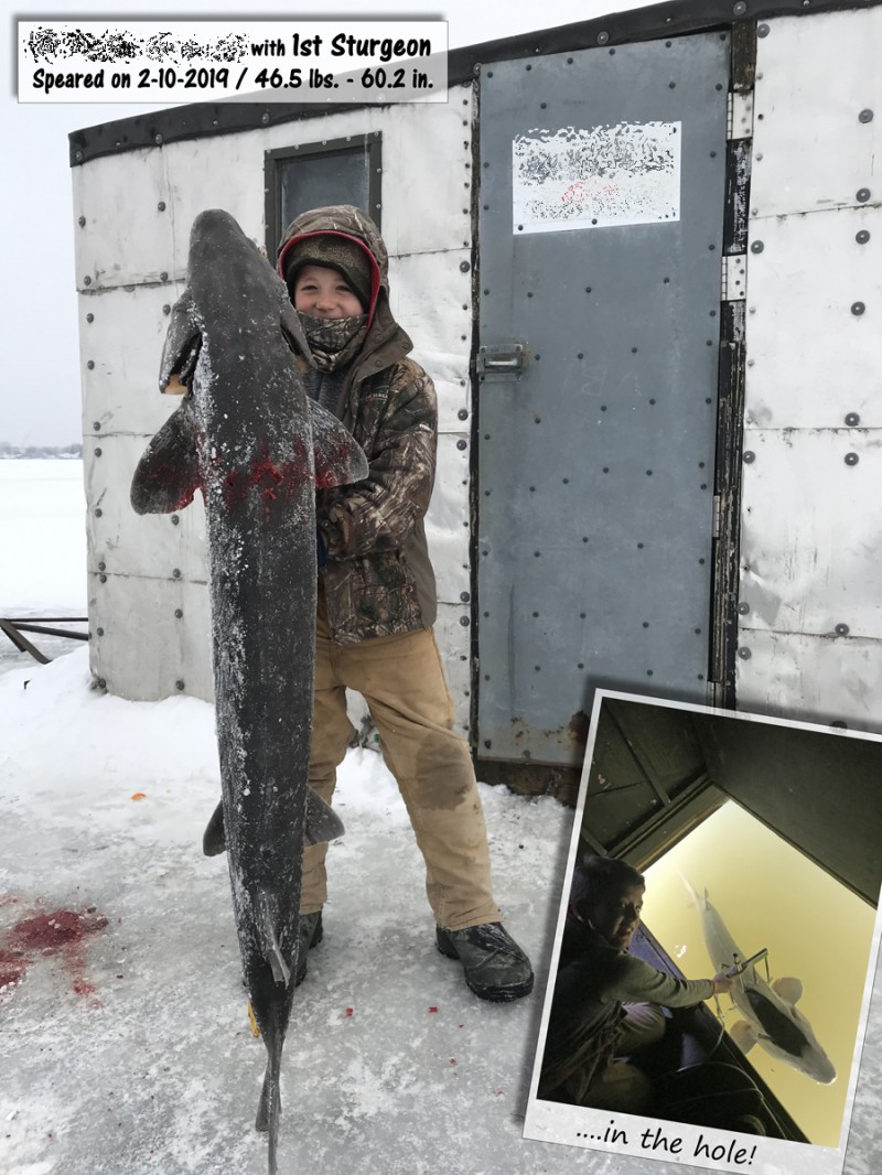 Photo print of an angler holding a sturgeon beside an ice shanty
