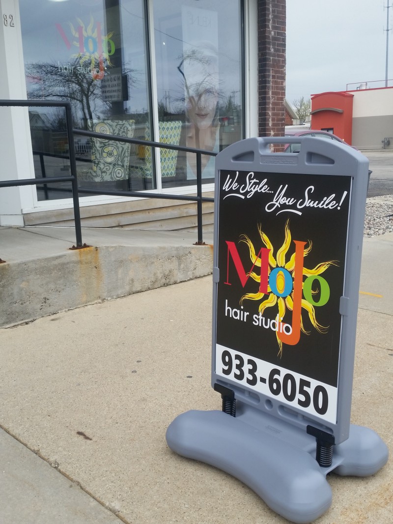 Sidewalk sign for a hair studio