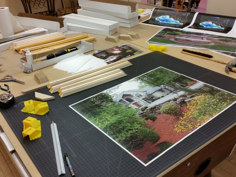 Canvas gallery wrap being stretched on a frame