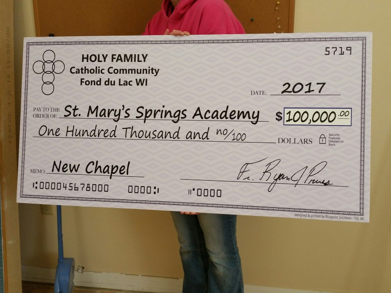 Oversized presentation check for St. Mary's Springs Academy