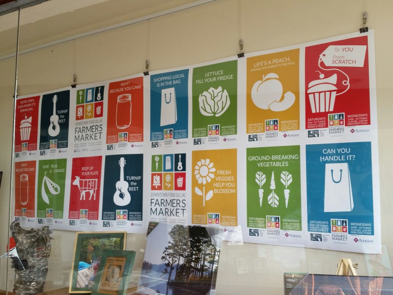 Farmers market posters hanging in a row