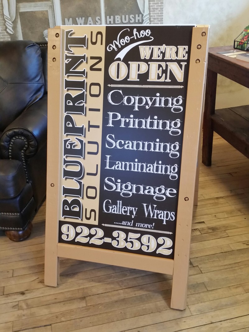 Blueprint Solutions sandwich board sign listing services