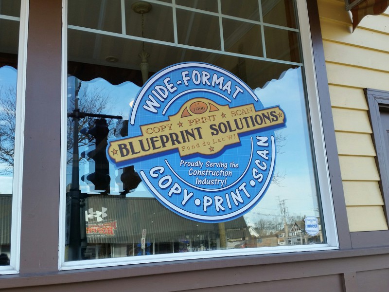 Blueprint Solutions logo window graphic on the shop front