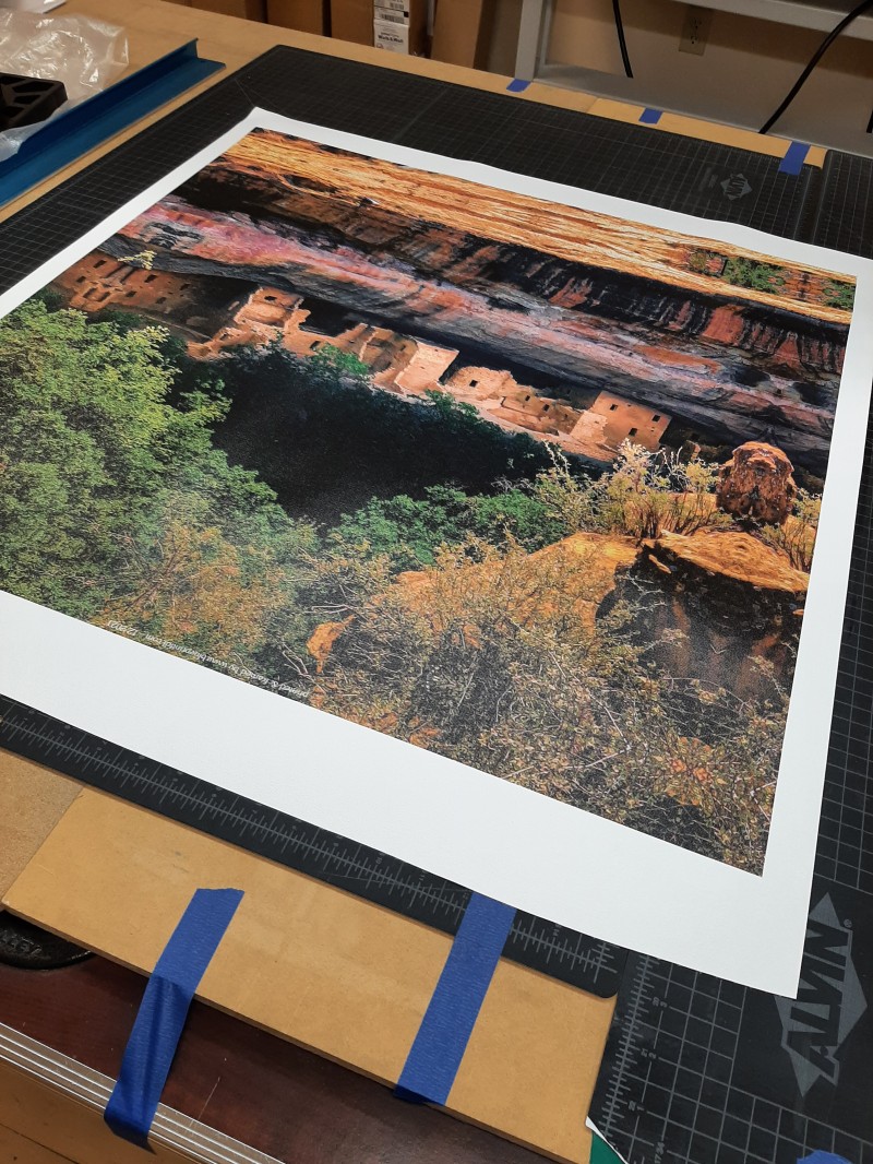 Large landscape print on a cutting table